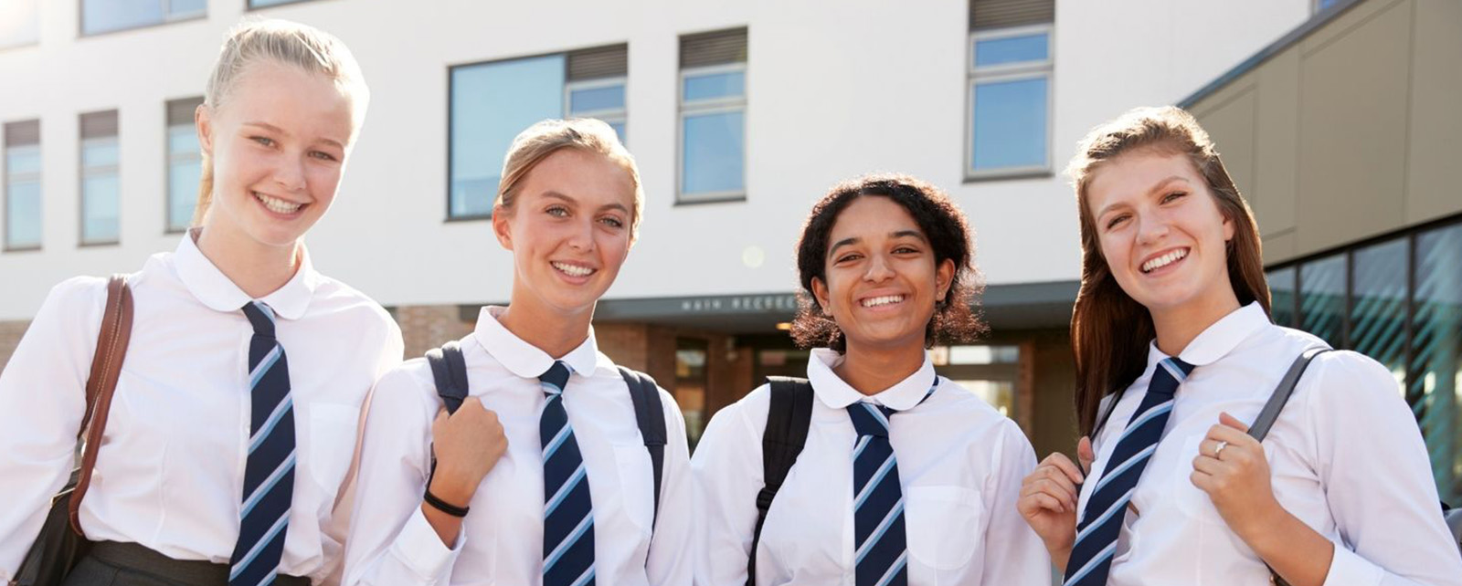 Four Students Outside School.jpg