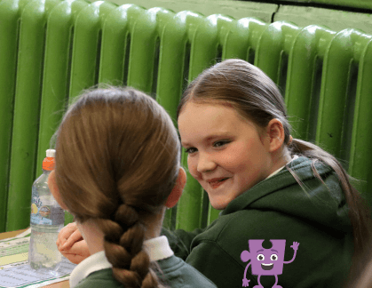 Two girls smiling together