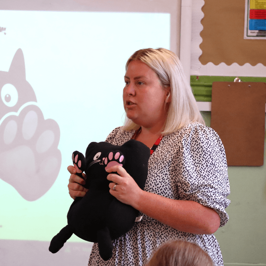 Teacher holding Jerry cat