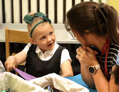 Pupil and teacher in discussion
