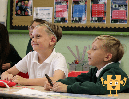 Two children in a lesson