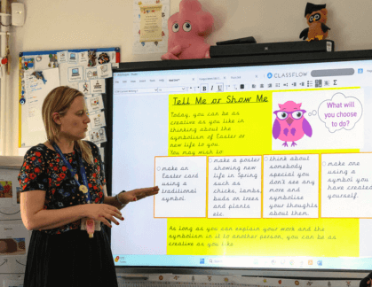 Teacher in front on whiteboard