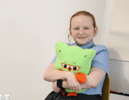 Girl holding a Jigsaw Owl