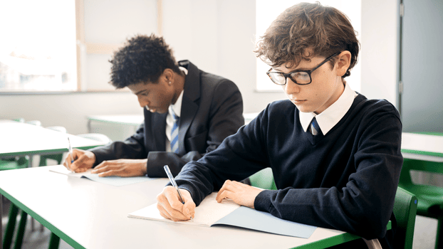 Two boys working at a desk
