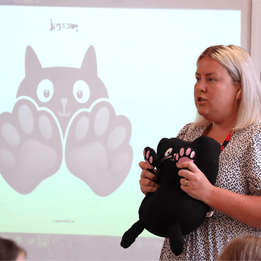 Teacher holding Jerry cat