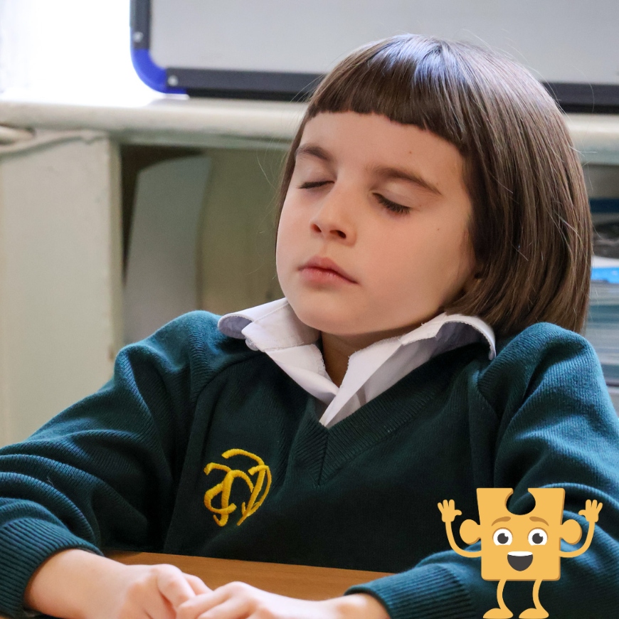 Child practicing meditation