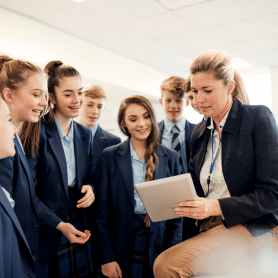 Group of children looking at a result with a teacher