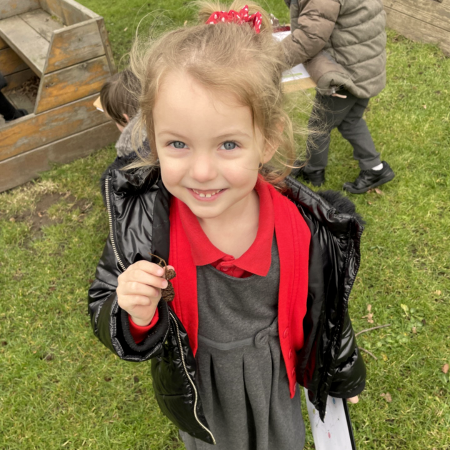 A younger pupil outside