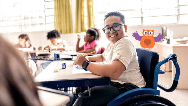 Disabled boy working at a desk