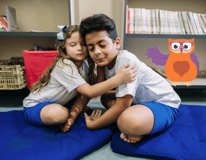 To children hugging each other